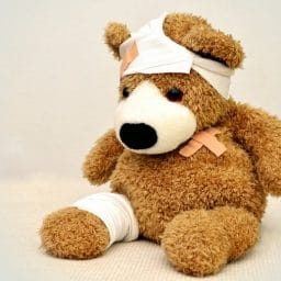 teddy bear covered in bandages