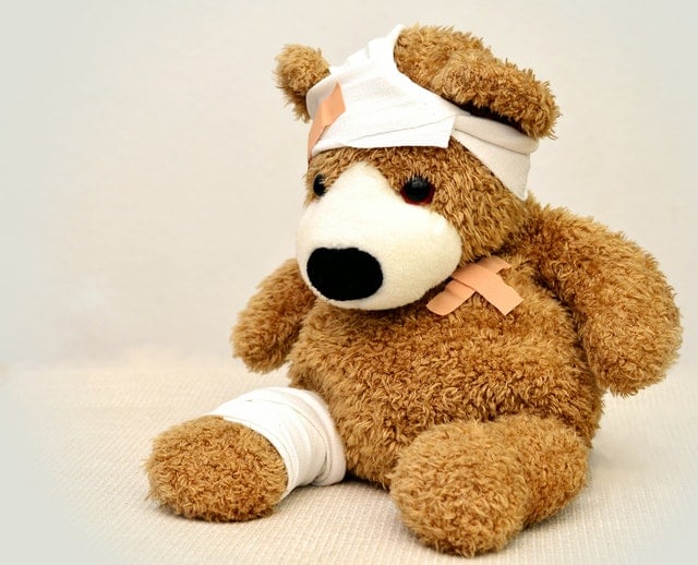 Teddy bear covered in bandages 
